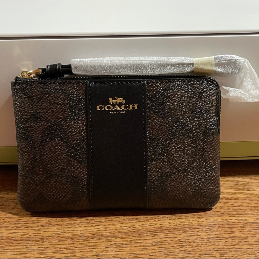 Coach Corner Zip Wristlet In Signature Canvas